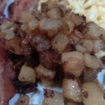 image of easy breakfast potatoes with onions.